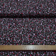 Tela Algodón Rosas Fondo Negro - Tela de algodón con dibujos de rosas pequeñas de color rosa y fucsia sobre un fondo negro. La tela mide 140cm de ancho y su composición 100% algodón.