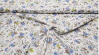 Tela Algodón Fino Flores Verde Azul - Tela fina de algodón tipo batista con dibujos floreados en tonos marrones, azules y verdes sobre un fondo blanco. La tela mide 140cm de ancho y su composición 100% algodón.