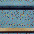 Cotton Flowers Dots Blue fabric - Organic cotton fabric with drawings of small colorful flowers and white polka dots on a blue background. The fabric is 150cm wide and its composition is 100% cotton.
