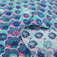 Cotton Retro Flowers fabric - Poplin cotton fabric with retro floral patterns in blue tones. The fabric is 140cm wide and its composition is 100% cotton.
