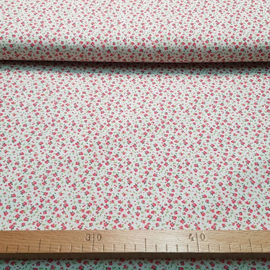 Cotton Tiny Roses fabric - Cotton poplin fabric with tiny rose drawings on a white background. This cotton fabric is perfect for your Patchwork projects. The fabric is 150cm wide and its composition is 100% cotton.