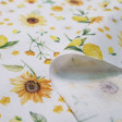 Tela Algodón Girasoles Limones - Tela de algodón orgánico (GOTS) con dibujos de girasoles y limones sobre un fondo blanco. La tela mide 150cm de ancho y su composición 100% algodón.