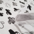 Cotton Cactus Black White fabric - Cotton poplin fabric with drawings of cactus figures in black and white. The fabric is 145cm wide and its composition is 100% cotton.