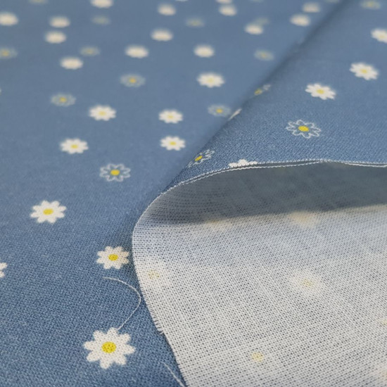 Cotton Daisies Lys fabric - Organic cotton poplin fabric with beautiful drawings of daisies on various colored backgrounds. The fabric is 150cm wide and its composition is 100% cotton.