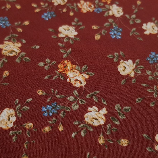 Cotton Roses Isabel fabric - Cotton fabric with drawings of roses on a maroon or black background to choose from. The fabric measures 140cm wide and its composition is 100% cotton.