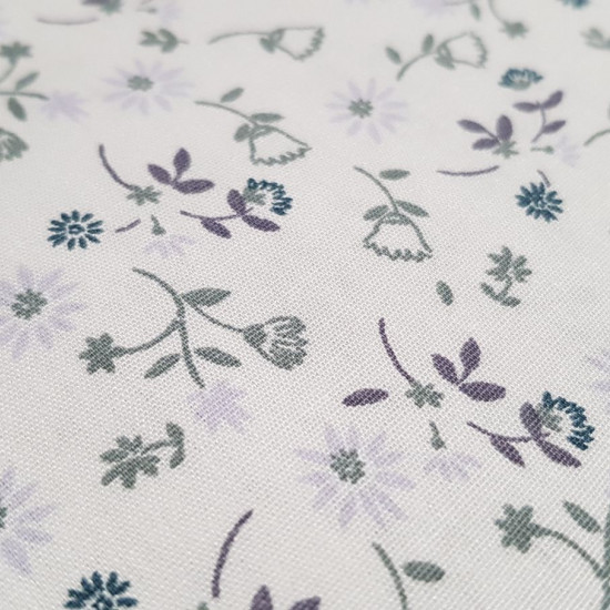 Cotton Flowers 15011 fabric - 100% cotton floral themed fabric with flower drawings. Ideal for children's clothing and decoration. The fabric is 140cm wide and its composition is 100% cotton.
