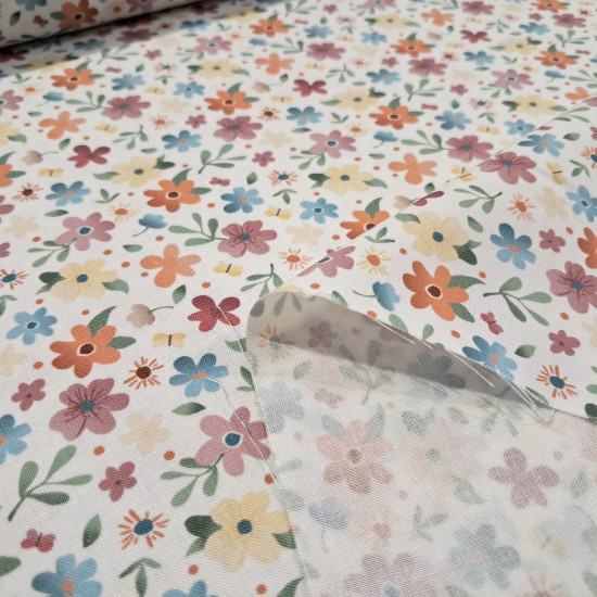 Cotton Flowers Colors Illusion fabric - Cotton poplin fabric with multicolored floral patterns and a gradient effect on a white background. The fabric is 150 cm wide and is made of 100% cotton.