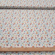 Cotton Flowers Colors Illusion fabric - Cotton poplin fabric with multicolored floral patterns and a gradient effect on a white background. The fabric is 150 cm wide and is made of 100% cotton.