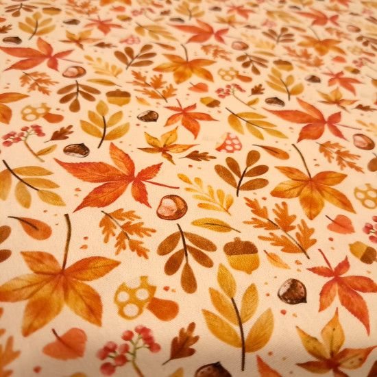 Cotton Autumn Branches fabric - Cotton poplin fabric with designs of branches and leaves in autumnal tones, chestnuts, and mushrooms on a light background. The fabric is 150 cm wide and is made of 100% cotton.