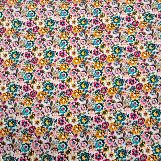 Algodón Flores Colores Efecto 3D - Tela de popelín algodón de temática floral en efecto 3D, con muchos colores. Ideal para confecciones infantiles, manualidades y decoración. La tela mide 150cm de ancho y su composici&