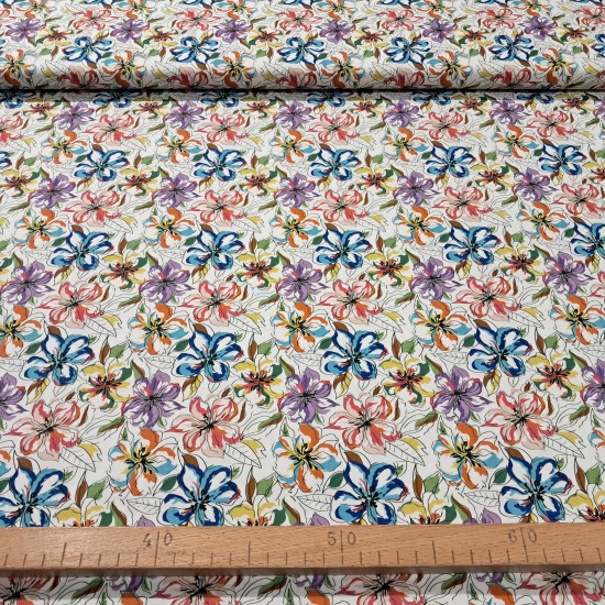 Algodón Flores Mimosa Etnia - Tejido de popelín algodón con dibujos de flores mimosas sobre fondo blanco. La tela mide 150cm de ancho y su composición 100% algodón.