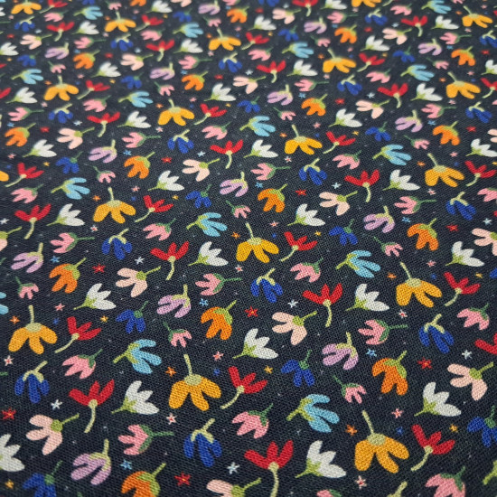 Cotton Flowers Etnia Blue fabric Cotton Flowers Etnia Blue fabric - Cotton poplin fabric with drawings of various colored flowers on a blue background. The fabric measures 150cm wide and is 100% cotton.