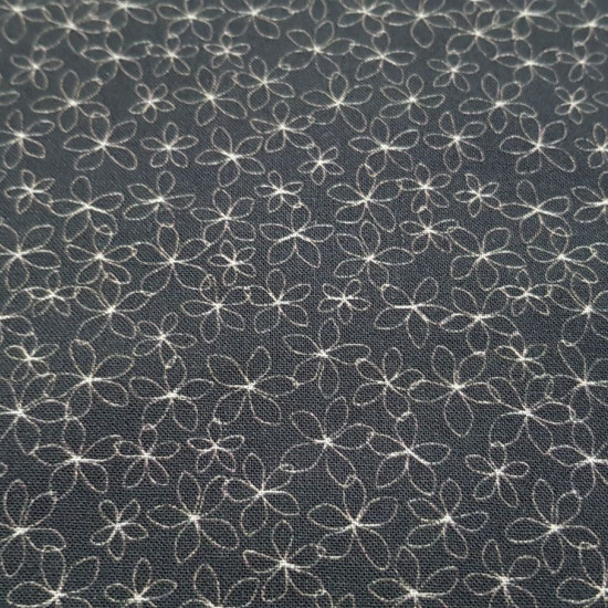 Cotton Flowers Flora Black fabric - Cotton fabric with flower outline drawings on a black background. Ideal for Patchwork. The fabric is 100% cotton and is 150cm wide.
