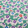 Cotton Floral Shapes Green Polka Dots fabric - Cotton fabric with drawings of floral shapes and stars where the white of the flowers predominates and the background of green dots. The fabric is 140cm wide and its composition is 100% cotton.