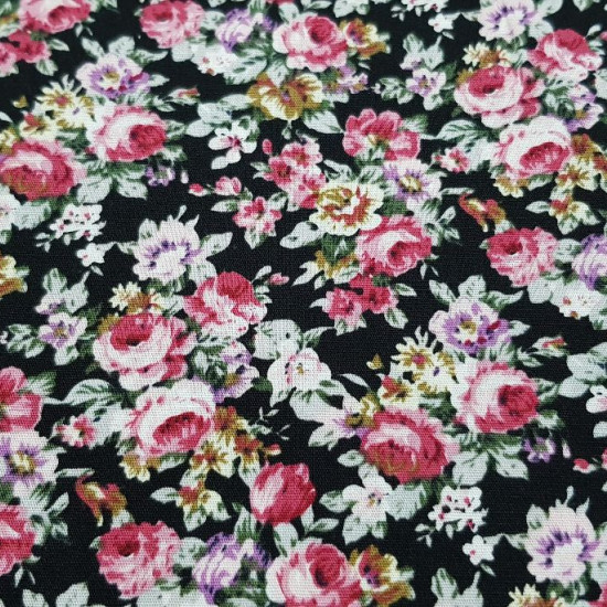 Cotton Big Roses Black fabric - Cotton fabric with drawings of roses on a black background. The fabric is 150cm wide and its composition is 100% cotton.
