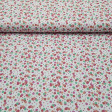 Cotton Multicolor Polka Dots White Background fabric - Cotton Poplin fabric with drawings of disparate sizes of polka dots colors on a white background. The fabric is 150cm wide and its composition is 100% cotton.