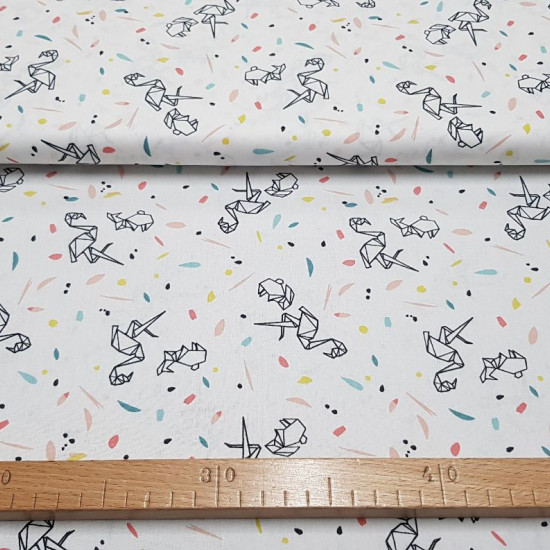 Cotton Flamingos Origami Confetti fabric - Cotton poplin fabric with origami drawings in the shapes of flamingos and rabbits on a white background with colorful confetti. The fabric is between 140-150cm wide and 100% cotton.