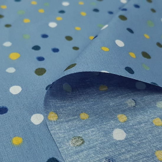 Tela Algodón Salpicaduras Colores Azul - Tela de algodón con dibujos de salpicaduras o manchitas de varios colores sobre un fondo de color azul. La tela mide 145cm de ancho y su composición 100% algodón