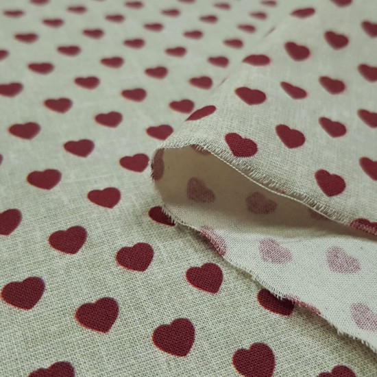 Cotton Linen Style Hearts fabric - Cotton fabric with drawings of hearts on a linen-style background. The fabric is 150cm wide and its composition is 100% cotton.