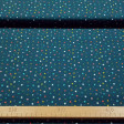 Tela Algodón Estrellas Colores Ecole - Tela de algodón orgánico (GOTS) con dibujos de estrellas de colores sobre un fondo azul oscuro haciendo un precioso contraste. La tela mide 150cm de ancho y su composición 100% algodón.