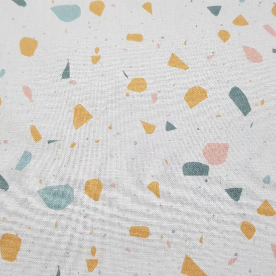 Cotton Confetti Colors fabric - Cotton poplin fabric with drawings simulating colored confetti on a white background. The fabric is 150cm wide and its composition is 100% cotton.