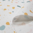 Cotton Confetti Colors fabric - Cotton poplin fabric with drawings simulating colored confetti on a white background. The fabric is 150cm wide and its composition is 100% cotton.