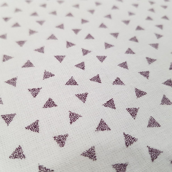 Cotton Aztec Triangles fabric - Fine and light cotton fabric with triangles on white background. The fabric measures 150cm wide and its 100% cotton composition.