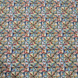 Cotton Mosaic Ornamental Geometric fabric - Cotton poplin fabric with geometric patterns forming an ornamental mosaic of multicolored triangles. The fabric is 150 cm wide and is made of 100% cotton.