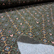 Cotton Geometric Hearts Mosaic fabric Cotton Geometric Hearts Mosaic fabric - Cotton poplin fabric with ornamental designs forming hydraulic-style mosaics and circles with hearts on a brown background. The fabric is 150 cm wide and is made of 100% cotton.