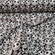 Cotton Jack Skulls fabric - Cotton fabric digital printing with drawings of skulls with pumpkin shapes that reminds us of the famous character Jack. The fabric is 140cm wide and its composition is 100% cotton.