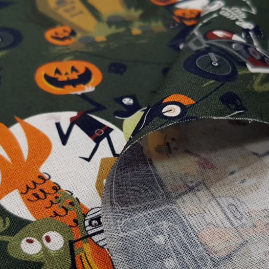 Cotton Halloween Pumpkins Motors fabric - Organic cotton fabric with Halloween-themed drawings, where skeletons appear on motorcycles and other monsters on cars in a decoration of graves, pumpkins, bats... The fabric is 150cm wide and its composition is 1