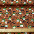 Cotton Halloween Green Hairs fabric - Organic cotton fabric with Halloween-themed drawings where different monsters appear with green hair and their faces painted in the Joker style, on an orange-brown background with bats. The fabric is 150cm wide and i