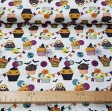 Cotton Halloween Cupcakes fabric - Cotton fabric with drawings of cupcakes decorated in Halloween style, with bones, eyes, spiders, bats... The fabric is 150cm wide and its composition is 100% cotton.