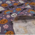 Cotton Halloween Party Hats fabric - Cotton fabric digital printing with Halloween drawings showing pumpkins, spiders with hats, skulls with hats, among other creatures, on a lilac background with candies, feathers... The fabric is 140cm wide and its co
