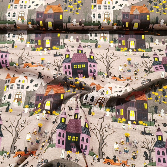 Cotton Happy Halloween fabric - Organic cotton poplin fabric with a Halloween theme with drawings of a city where they celebrate this popular trick or treat party, where characters such as mummies, cats, ghosts, skulls, witches appear ... The fabri