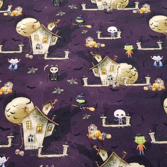 Cotton Halloween Haunted House fabric - Halloween-themed organic cotton poplin fabric with drawings of a haunted house, vampires, flying witches, pumpkins, bats... on a purple background. The fabric is 150cm wide and its composition is 100% cotton.