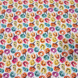 Cotton Halloween Pumpkins Colors Spooky fabric - Cotton poplin fabric with Halloween-themed designs featuring colorful pumpkins with faces and decorated hats on a white background. The fabric is 150 cm wide and is made of 100% cotton.
