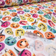 Cotton Halloween Pumpkins Colors Spooky fabric - Cotton poplin fabric with Halloween-themed designs featuring colorful pumpkins with faces and decorated hats on a white background. The fabric is 150 cm wide and is made of 100% cotton.
