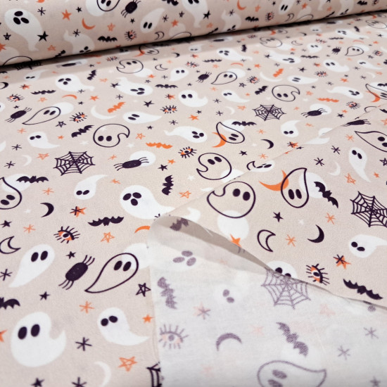 Cotton Halloween Spooky Ghosts fabric Cotton Halloween Spooky Ghosts fabric - Halloween-themed cotton poplin fabric featuring ghosts, bats, stars, and spiderwebs on a light background. The fabric is 150 cm wide and is made of 100% cotton.