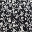 Cotton Skulls Pirate Saber fabric - Cotton fabric with drawings of pirate skulls with crossed sabers on a black background. The fabric is 140cm wide and its composition is 100% cotton.
