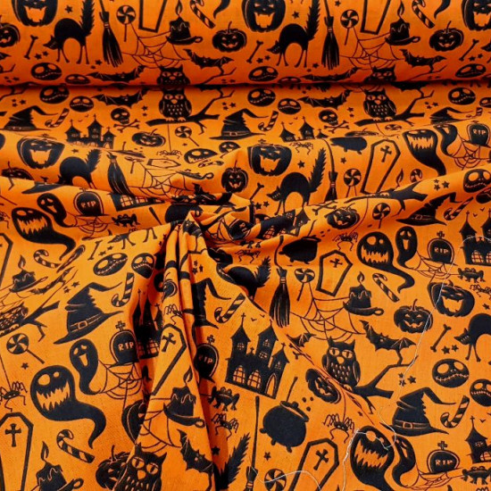Polycotton Halloween Orange fabric - Fine polyester and cotton fabric with Halloween-themed drawings where witch hats, skeletons, cauldrons, ghosts, graves... appear on an orange background. The fabric is 110cm wide and its composition is 80% polyester