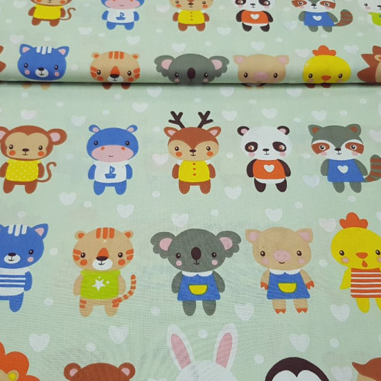Cotton Stuffed Animals fabric - Children's cotton fabric with drawings of very cute animals with a stuffed animal on a light green background and white heart shapes.
