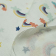 Cotton Clouds Colors and Stars fabric - Children's themed cotton fabric with colorful cloud and rainbow drawings on a light background with colored stars. The fabric is 150cm wide and its composition 100% cotton.