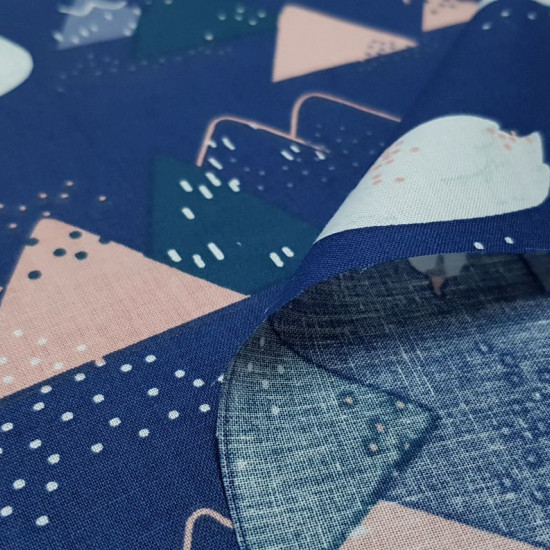 Cotton Swans between mountains blue fabric - Children's cotton poplin fabric with drawings of white swans on a dark blue background on which mountain shapes appear. The fabric is 160cm wide and its composition 100% cotton.