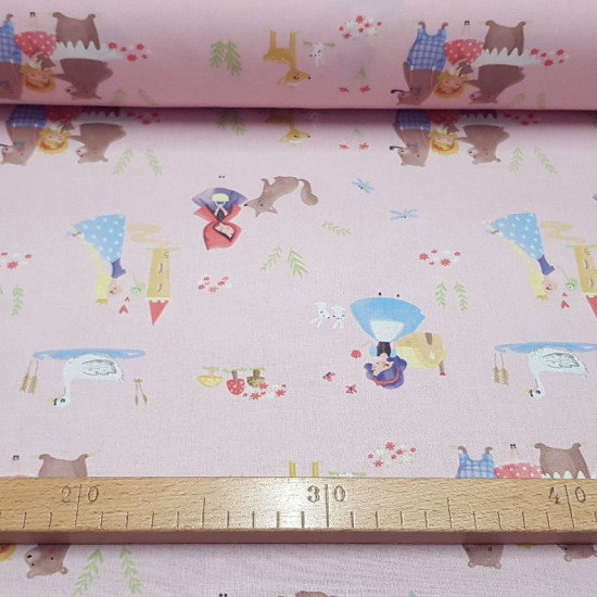 Cotton Childrens Tales Pink fabric - Poplin cotton fabric with drawings of classic children's stories such as the little red riding hood, rapuntzel, snow white... all on a light pink background. Fabric made in Spain. The fabric is 150cm wide and its com