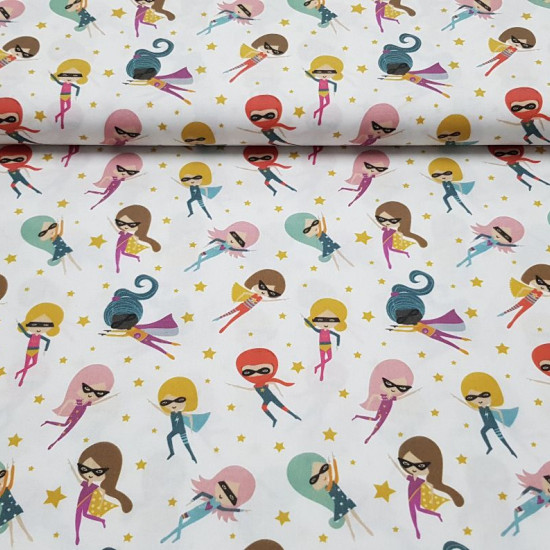 Cotton Superheroines Stars fabric - Organic cotton poplin fabric with superheroine drawings with masks, on a white background with gold-colored stars. The fabric is 150cm wide and its composition is 100% cotton.