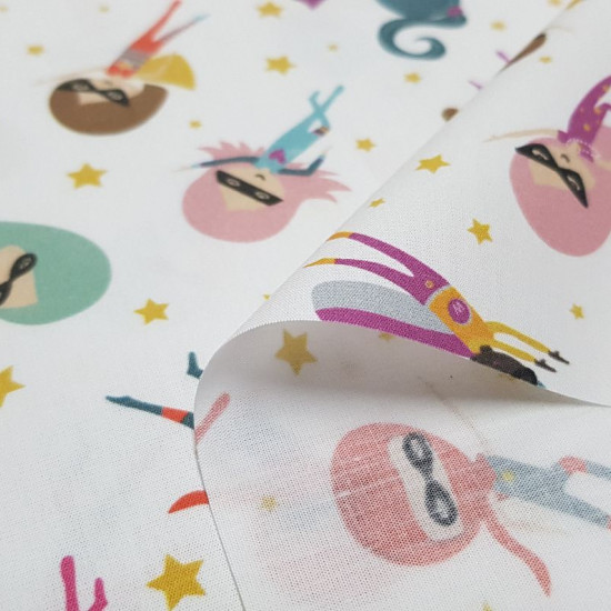 Cotton Superheroines Stars fabric - Organic cotton poplin fabric with superheroine drawings with masks, on a white background with gold-colored stars. The fabric is 150cm wide and its composition is 100% cotton.