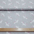 Cotton Unicorns Gray Background fabric - Cotton poplin fabric with unicorn drawings with fuchsia mane and golden horn on a gray background with white diamonds and stars. The fabric is 150cm wide and its composition is 100% cotton.