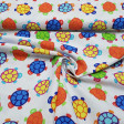 Cotton Turtles Colors fabric - Cotton fabric with children's drawings of colorful turtles on a white background. The fabric is 150cm wide and its composition is 100% cotton.