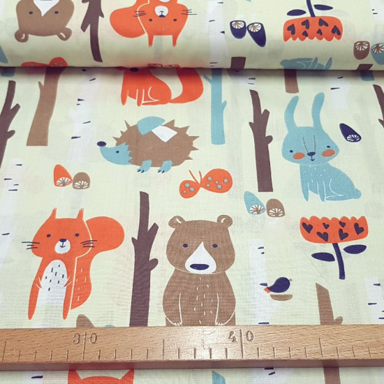 Cotton Animals Mushrooms Forest fabric - Children's cotton poplin fabric with large drawings of animals, mushrooms in the forest, tree trunks and flowers on a light beige background. The fabric is 160cm wide and its composition is 100% cotton.